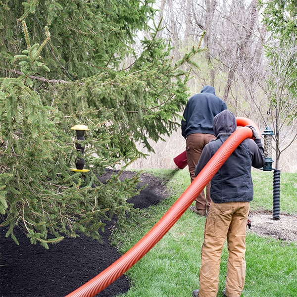 mulch blowing is a non-invasive process that minimizes disruption to existing landscaping